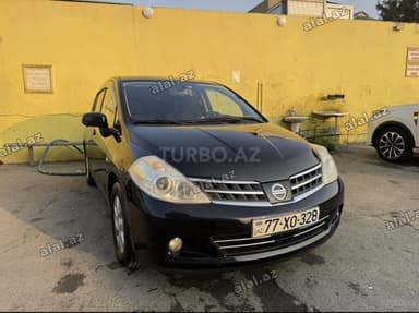 Nissan Tiida: 1.5 l | 2012 il Hetçbek