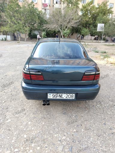 Opel Omega B sedan - Kuzov: 4 qapılı sedan, tünd yaşıl rəng -