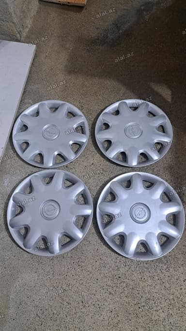 Opel üçün orijinal disk qapaqları (4 ədəd) - Rəng: gümüşü - Material