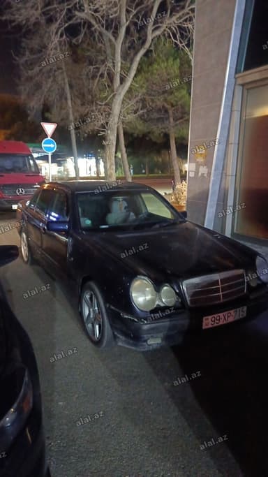 Mercedes-Benz E-Class (W210) sedan - Korpus: 4 qapılı sedan, tünd göy