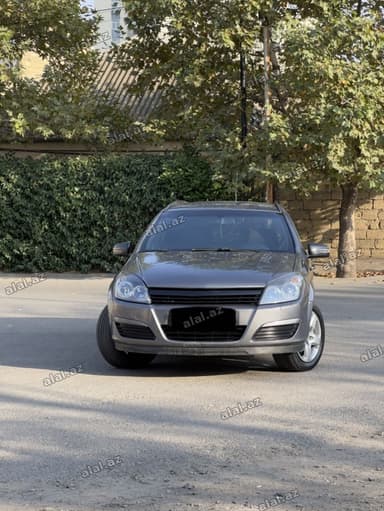 Opel Astra H Caravan (universal) – boz rəngdə, 5 qapılı
