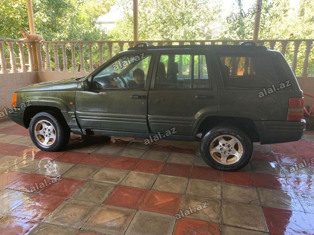 Jeep Grand Cherokee: 4 l | 1995 il Ofrouder/SUV