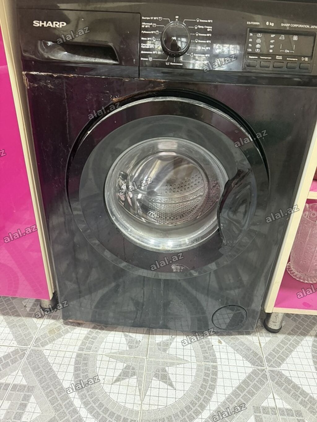 SHARP önyükləməli paltaryuyan maşın Tək problemi qapağı boşalıb