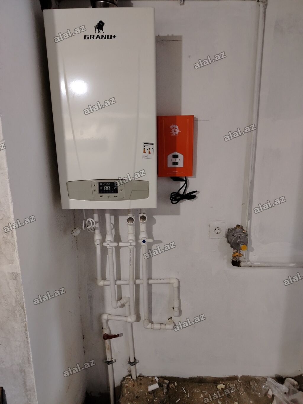Kombilerin qurasdirilmasi montaji Radiatorlarin montaji ve cekilsi