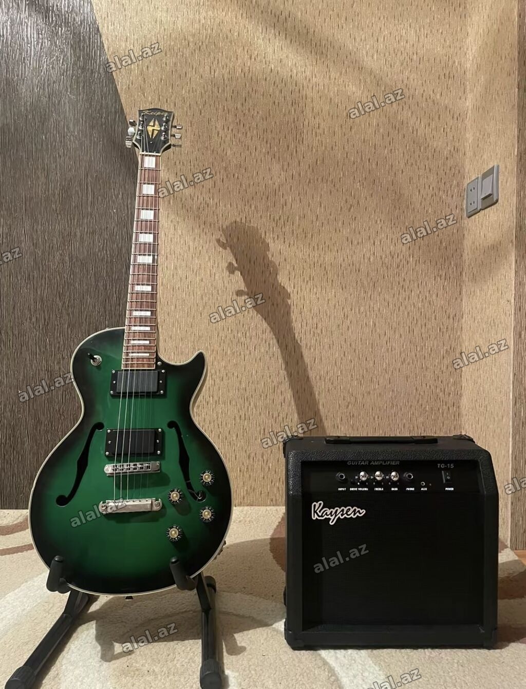 Salam les paul növlü elektro gitardır. Heçbir problemi yoxdu, set