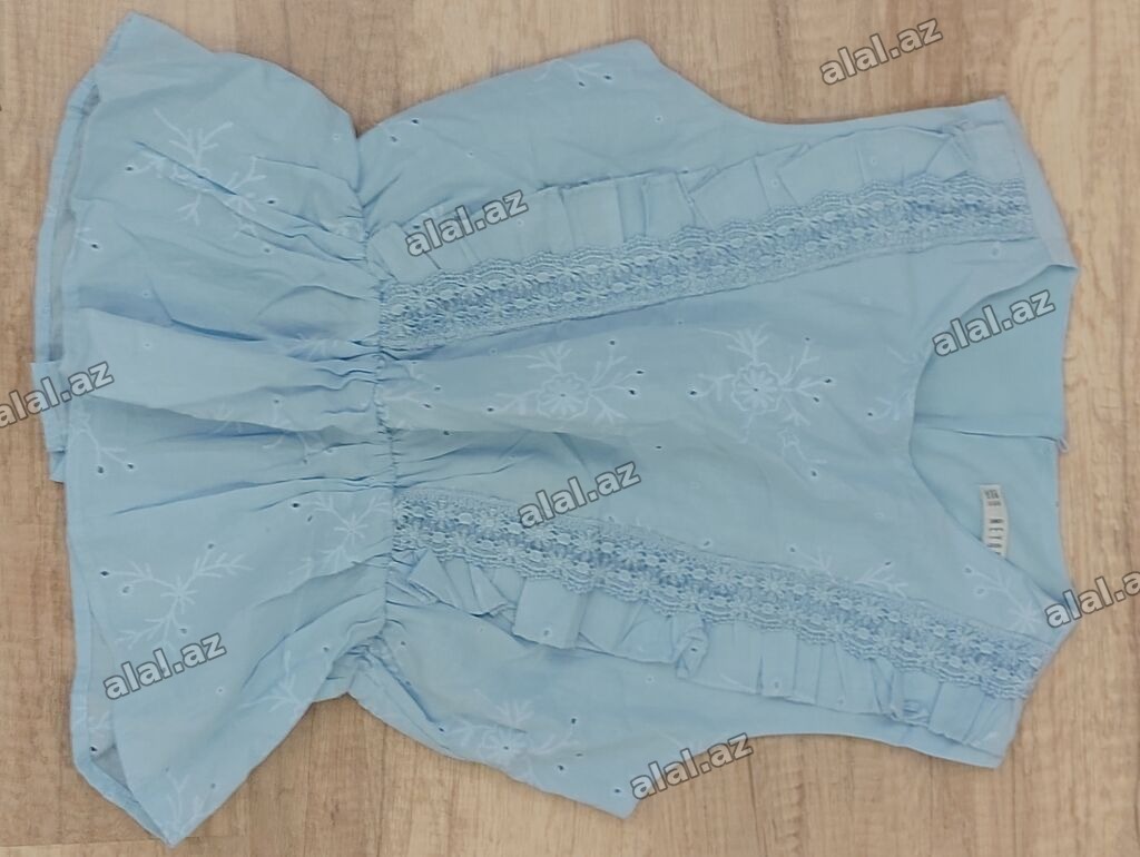 Uşaq üçün qız köynəyi/bluzası – açıq mavi rəngdə, tezedır. - Model
