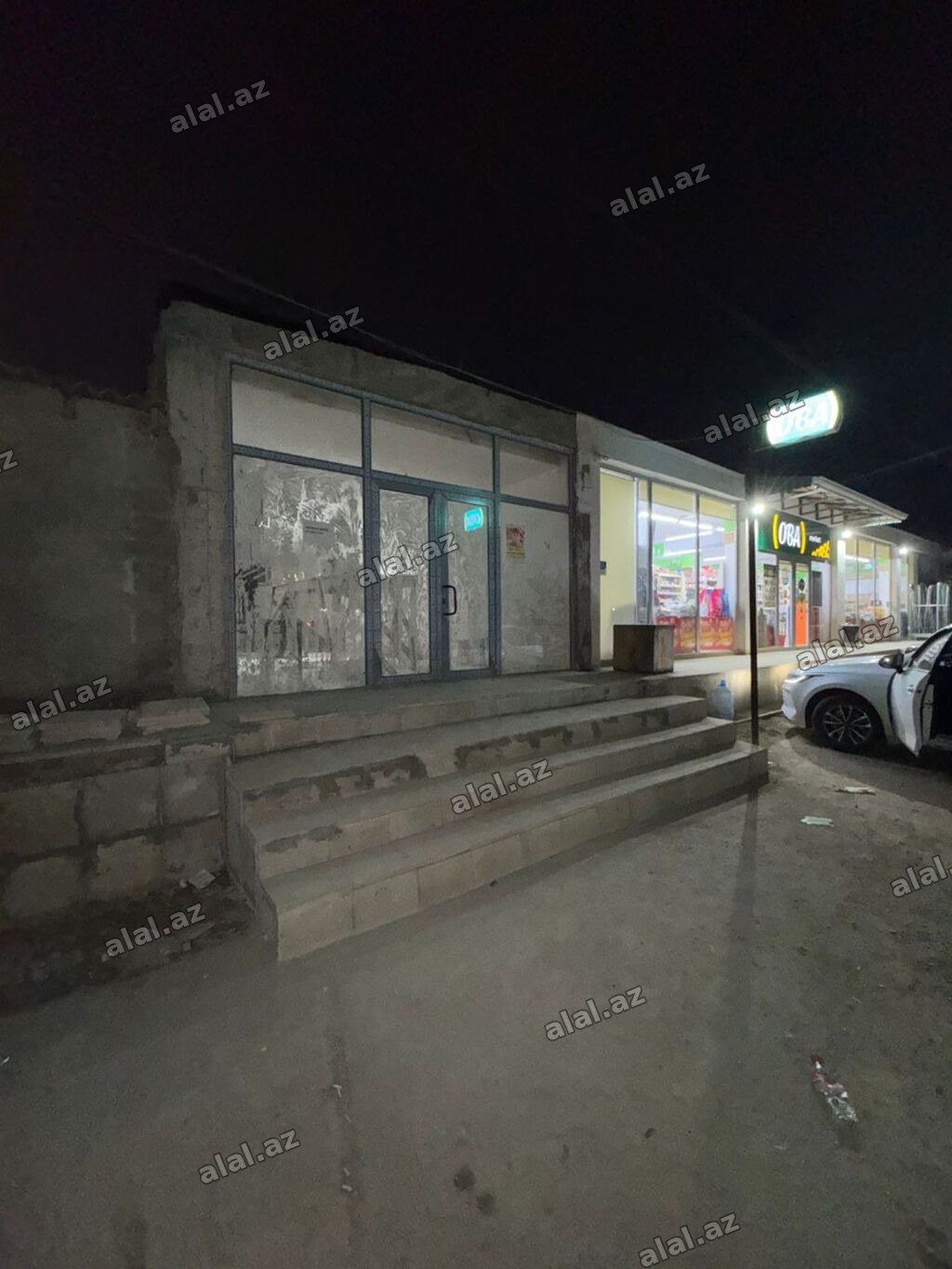 Abyektin çox cuzi temiri qalib qarşisinde bina var yaninda oba market