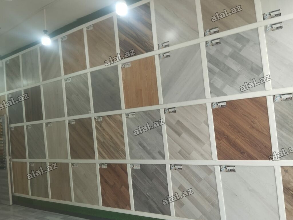 Məhsul: Laminat döşəmə panelləri (geniş rəng və tekstura seçimi)