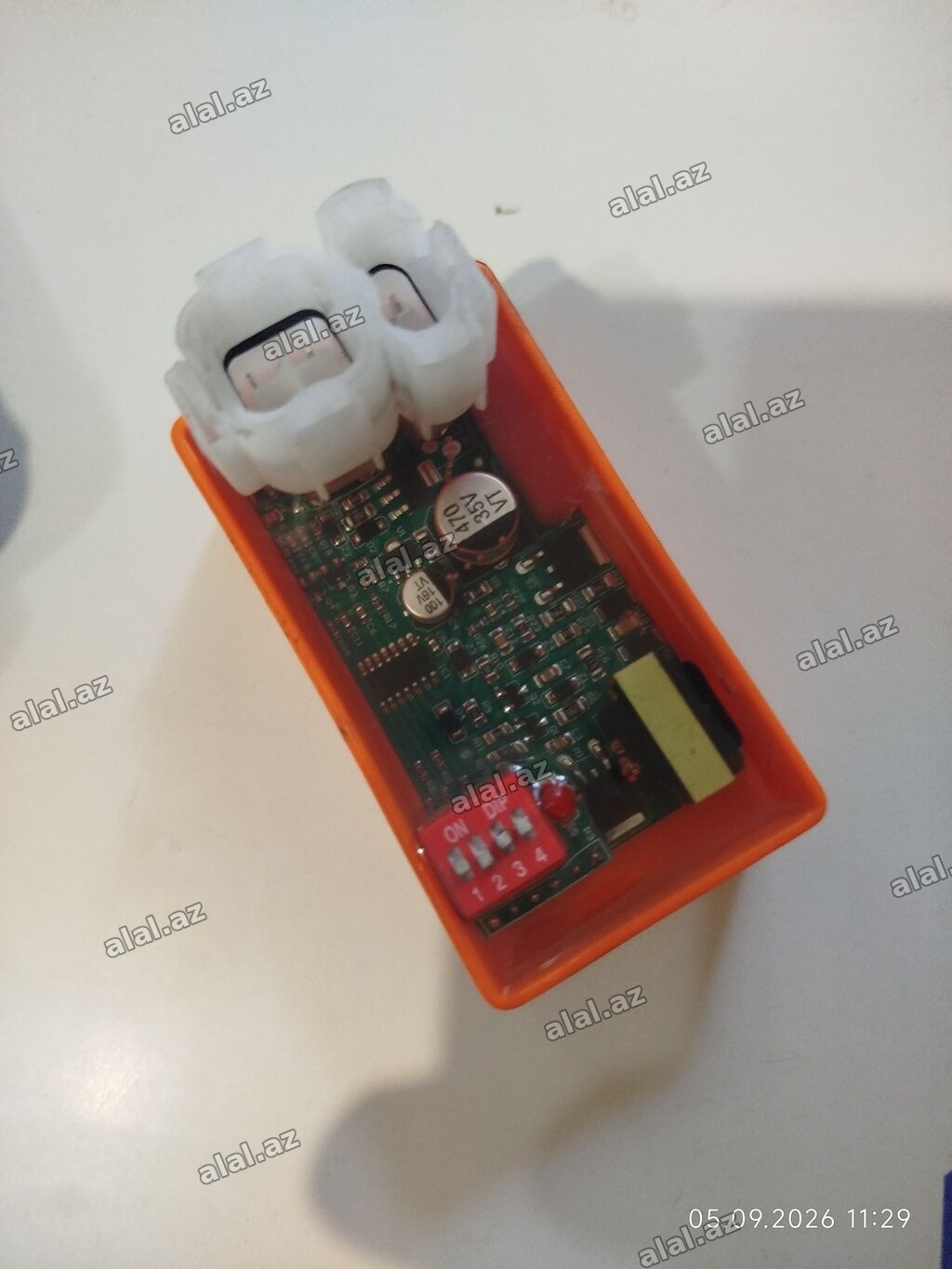 Elektron idarəetmə modulu - Portağal rəngli korpusda kompakt PCB