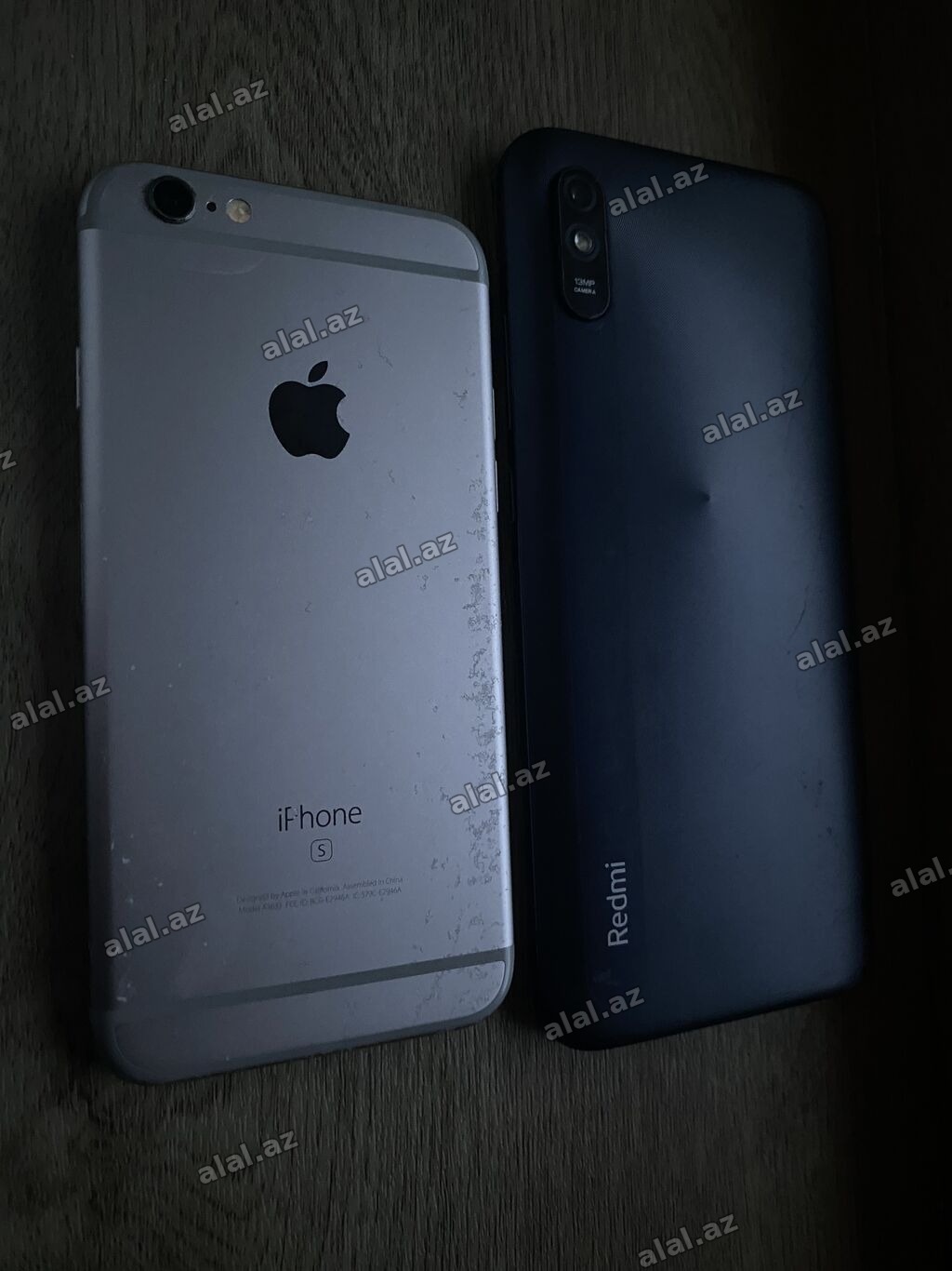 İkisi bir yerda 80 azn Ayfon 6s pili deyismelidi Redmi 9a tek qabag