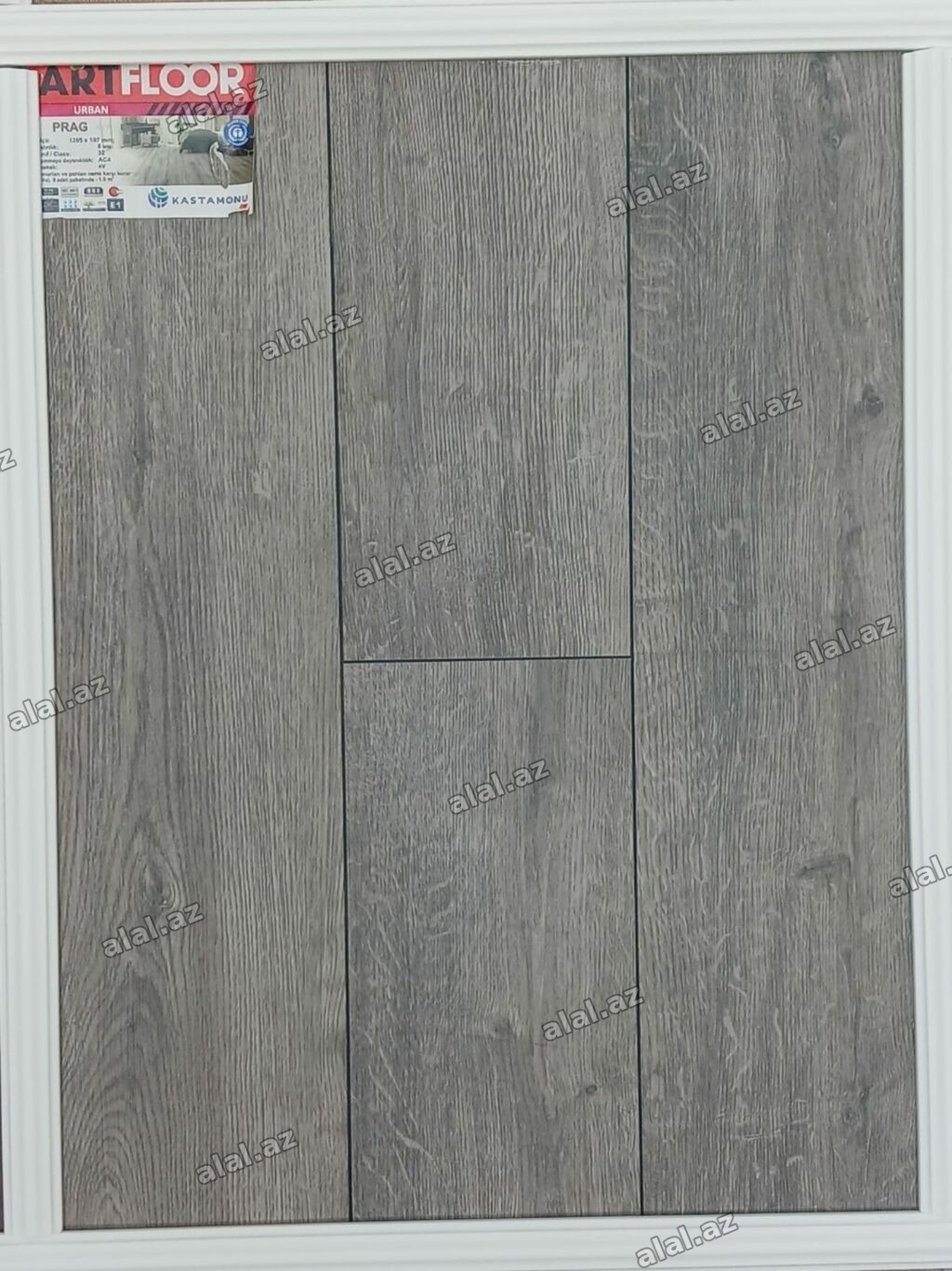 Artfloor şirkətinin Prag modelindən olan boz rəngli laminat döşəməsi